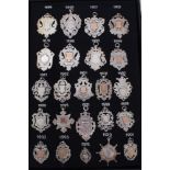Collection twenty five late Victorian , Edwardian and later silver watch fobs (25)