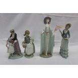 Four Lladro figures, including a lady with parasol, a lady in a long dress, mother and child, and a