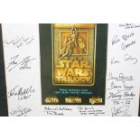 Star Wars memorabilia, including trilogy poster with signed mount, other posters for Star Wars and