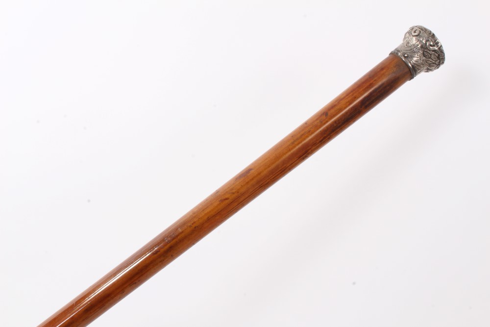 Unusual Victorian Malacca dagger stick with embossed silver top (Birmingham 1897) and concealed