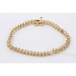 Gold (stamped 14k) diamond set bracelet