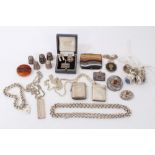 Group of silver jewellery to include a stamp holder, two vesta cases, Scottish agate brooches,