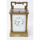 Good quality large brass cased carriage clock with enamel dial signed Barraclough and repeating