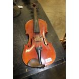 Antique violin bearing label stating ‘Antonius Stradiurarius Cremonensis Faciebat anno 1725’,