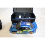 Remote control Subaru Racing Car with Techniplus controller both in carrying cases.