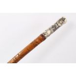 Late 19th/early 20th century Japanese Bamboo walking stick with carved pokerwork decoration and