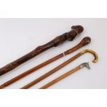 Early 20th century "Natural" walking stick, possibly Holly, 92cm, together with an cane swagger