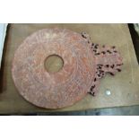 Chinese carved stone Bi disc of archaic circular form 25cm x 33.5cm