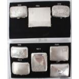 Eight late Victorian and later silver cigarette cases