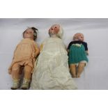 Three Amand Marseille Dolls including 990 A.4.M. bisque head doll, painted brows lashes and lip,