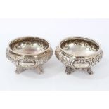 Pair Victorian silver salts of cauldron form with scroll and foliate decoration