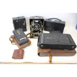 Vintage film cameras inc Ensign Sanderson hand camera