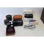 Photographic items including Vivitar Opus 20 camera, various interchangeable lenses, flash bulbs