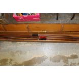 Collection of antique longbows in wooden case