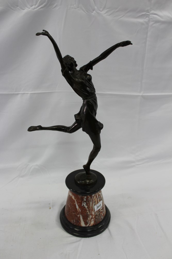 Manner of Bruno Zach- reproduction bronze figure of a dancing girl, mounted on marble base, cm in