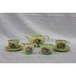 Clarice Cliff Spring Crocus pattern tea for two set, comprising teapot, milk jug, sugar bowl, two