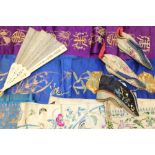 Antique Chinese hand embroidered silk panels including two pairs of sleeve bands and a pair of