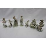 Collection of 7 Lladro figures, to include 2 ballet dancers, fisherman, etc