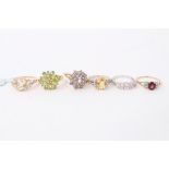 Six gold 9ct multi gem set dress rings