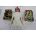 Antique Wax doll, together with two small wooden peg dolls