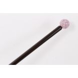 Late 19th century/early 20th century ladies slender walking stick with amethyst roundel top, 83.5cm
