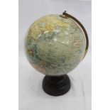 Early 20th century Geograpia 10 inch Terrestrial Globe on circular Bakerlite base.