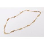 Gold (18ct) necklace interspaced with pearls