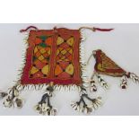 Collection of Antique Banjara textiles three pieces with cowrie shells including an embroidered cow