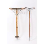 Late 19th/early 20th Bamboo shooting stick with folding Rattan seat and metal fittings stamped Btt