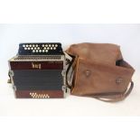 Continental Squeeze Box by Hug in Canvas carry case