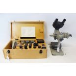 Vintage Russian microscope, with wooden case containing lenses, parts, etc