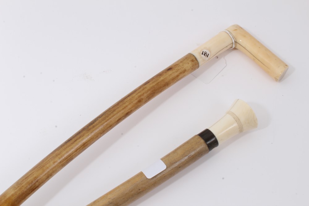 Unusual walking stick with heavy pale wood shaft, white metal collar and turned ivory handle,