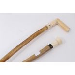 Unusual walking stick with heavy pale wood shaft, white metal collar and turned ivory handle,