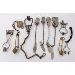 Collection of 10 antique Victorian and later ladies' skirt lifters, including several with chains,