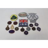 Collection of automobilia - car badges and motorcycle medals