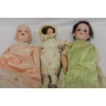 Dolls including Armand Marseille Floradora. Bisque head, brown sleeping eyes, open mouth top four