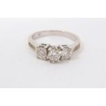 White gold 18ct diamond three stone ring with diamond set shoulders