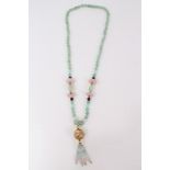 Green hard stone bead necklace decorated with rose quartz beads and gilt floral enamelled large