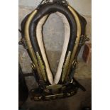 Superb early 20th century heavy horse collar, mounted with ornamental brass studs and plaques and