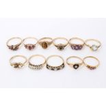 Eleven gold (9ct) gem set dress rings