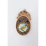 9ct gold and enamel canary fancier’s medal