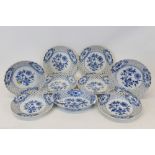 Group of Eight Meissen Onion pattern plates with reticulated borders, together with a similar onion