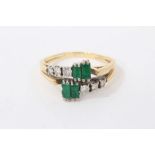 18ct gold emerald and diamond cross-over ring with four step cut emeralds and graduated brilliant