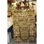 Exceptional display board of working horse brass terrets and ornamental brasses