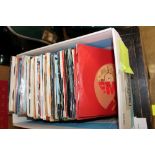 Box of single records including Queen, Bowie, The Sweet, The Small Faces and The Doors.