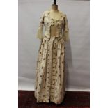 Victorian floral print dress and matching fitted and shaped jacket both with net lace trim and