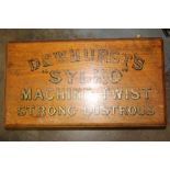 Dewhurst's 'Silko' sign written oak two drawer cabinet.