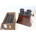 Brewster stereoscopic viewer together with a box of twelve 19th century glass slides