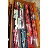 Diecast selection of mostly unboxed Buses, housed in eight wooden wall cabinets plus others