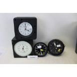 Group of four government clocks